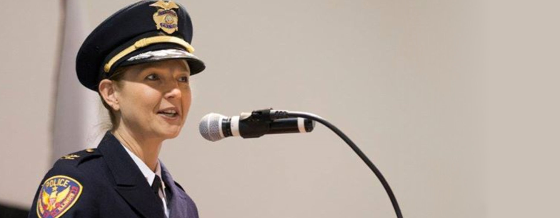 woman in uniform on stage